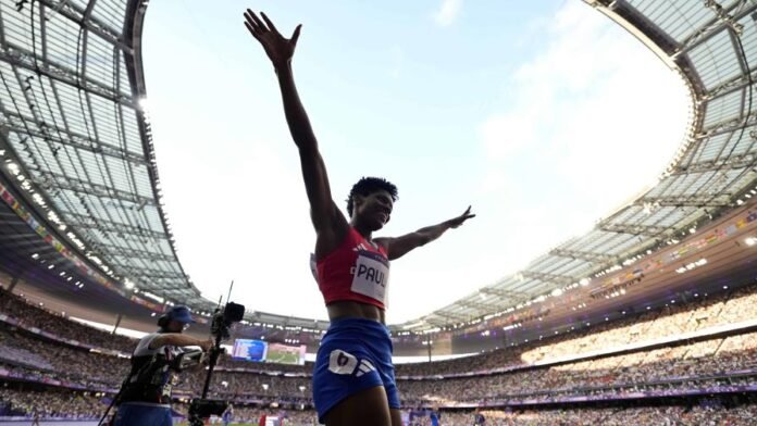 juegos-olimpicos-2024marileidy-paulino-celebra-tras-ganar-los-400-metros-en-el-atletismo-el-viernes-9-de-agosto-de-2024-en-saint-denis-ap-ashley-landis-474689c6-focus-0-0-896-504